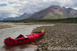 canoe equiped with spray deck, snake river, Yukon