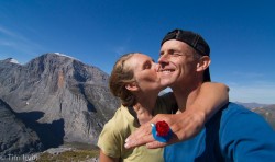 Two people get engaged on top of a mountain in the Yukon with a candy ring